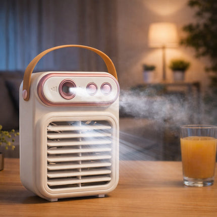 Vintage-style humidifier emitting mist on a wooden table with a glass of orange juice.