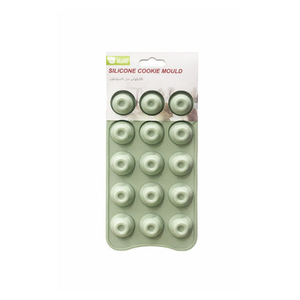 Silicone cookie mould with packaging on a white background
