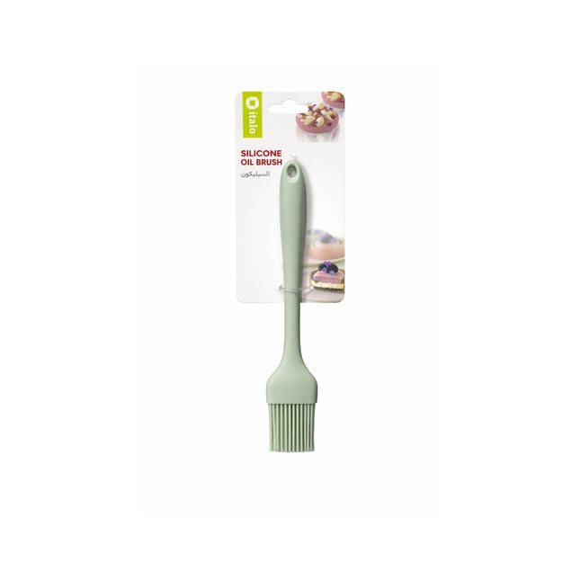 Silicone oil brush with packaging on a white background