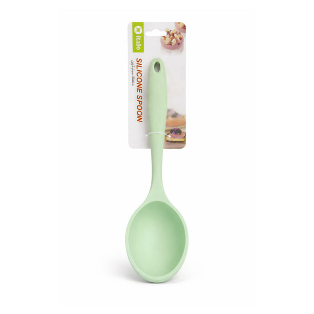 Green silicone spoon with packaging on a white background
