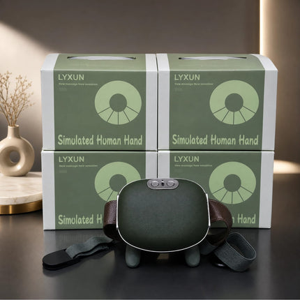 A LYXUN simulated human hand massage device in dark green and brown leather with a gray strap, displayed in front of four matching green and white product boxes on a dark tabletop.