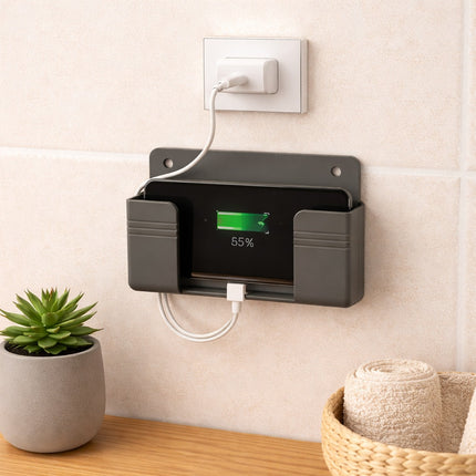 Wall-mounted charging station with digital display and power outlet on a light-colored wall.