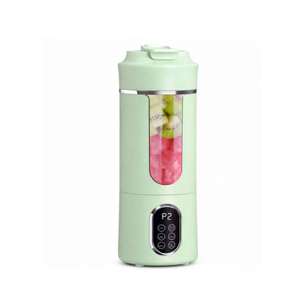 Green portable blender with a clear lid showing ingredients on a white background