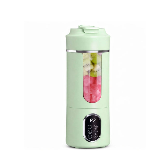 Green portable blender with a clear lid showing ingredients on a white background