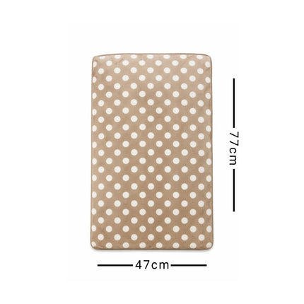 Beige mat with white polka dots and measurements on a white background