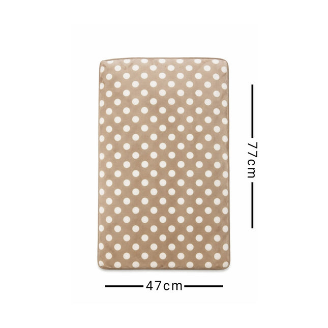 Beige mat with white polka dots and measurements on a white background