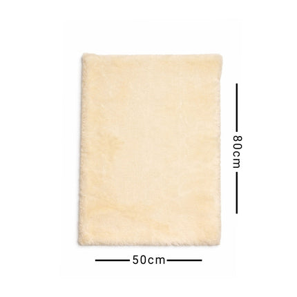 Beige rug with dimensions 50cm x 80cm on a white background