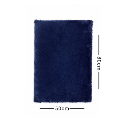Navy blue rug with dimensions 50cm x 80cm on a white background