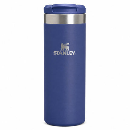 A blue Stanley travel tumbler with a stainless steel band and a matching blue lid, shown on a plain white background.