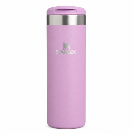 A light pink Stanley travel tumbler with a stainless steel rim and a matching pink lid, shown on a plain white background.