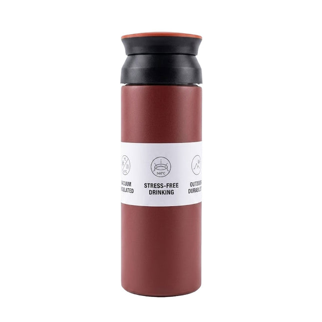 Red and black insulated travel mug with a white label on a white background