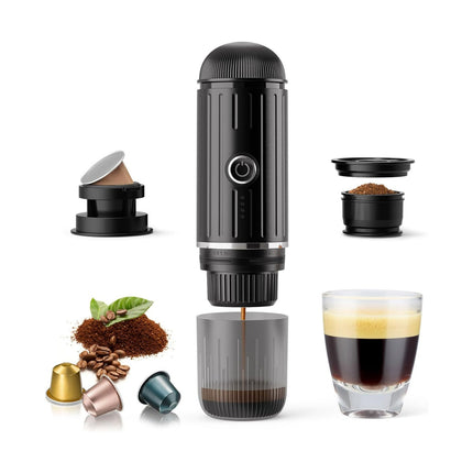 Black portable espresso maker with components and a glass of coffee on a white background