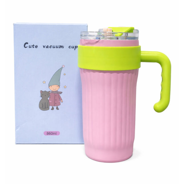 Pink vacuum cup with green handle and lid next to a purple box with cartoon illustrations on a white background