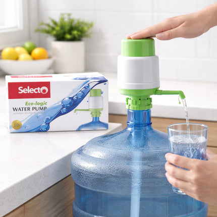 Person using a water pump to fill a glass with water, next to Selecto water pump packaging.