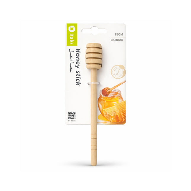 Wooden honey stick with packaging on a white background